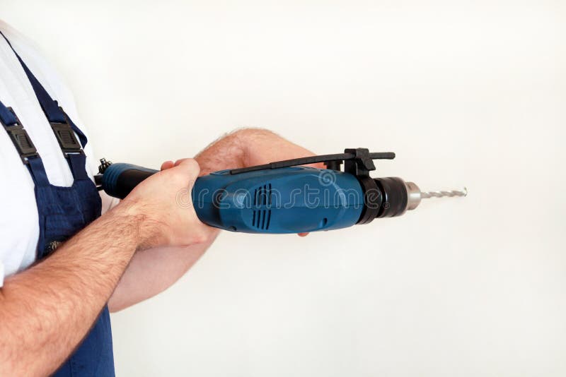 Construction Worker, Handyman and Builder with Blue Electric Drill