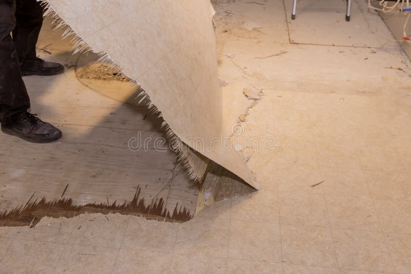 Worker Remove, Demolish Old Tiles a Bathroom with Jackhammer, Stock Photo Image of house