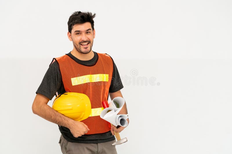 Construction worker standing on white background. stock photos
