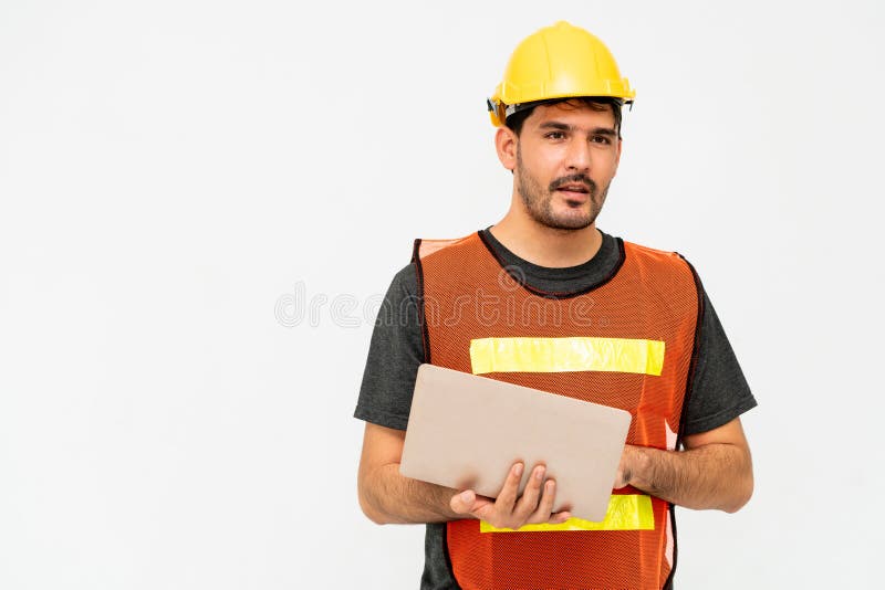 Construction worker standing on white background. royalty free stock image