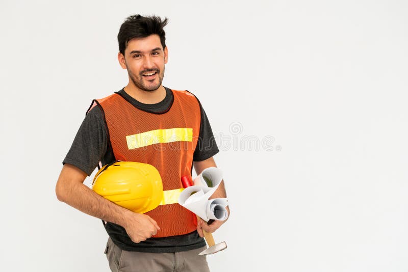 Construction worker standing on white background. stock photo