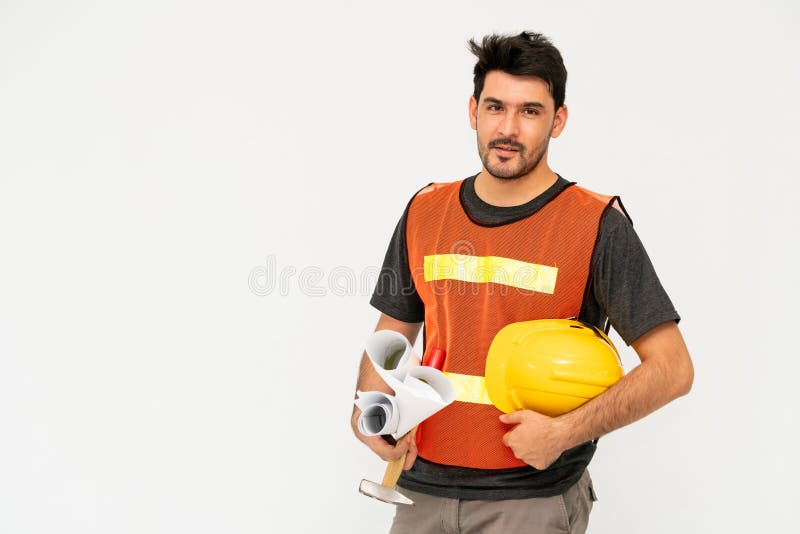 Construction worker standing on white background. royalty free stock image