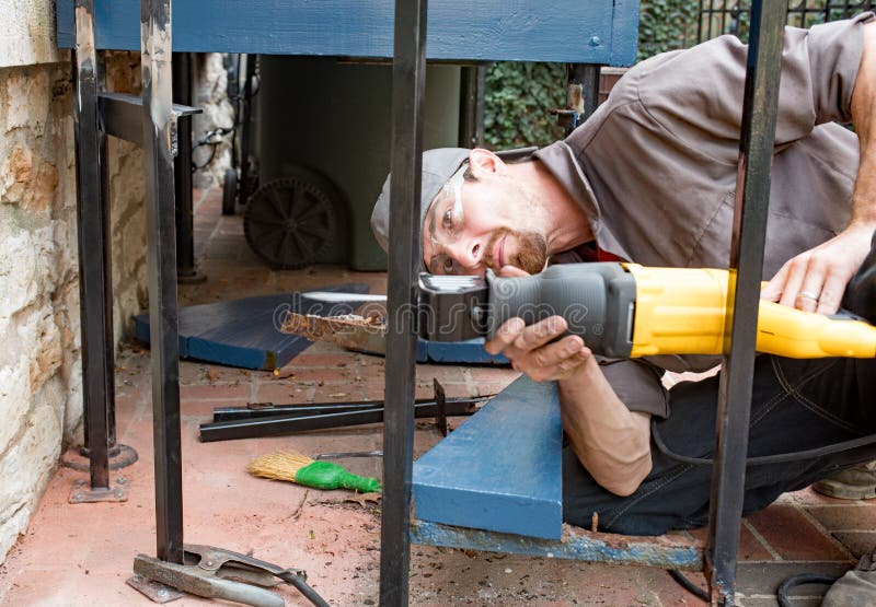 Worker Cutting Metal Studs stock photo. Image of caucasian 6743512