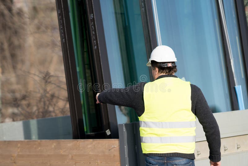Construction worker at work on construction site stock image Construction worker at work on construction site stock image