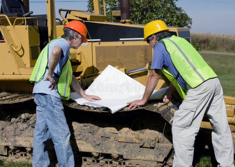 Heavy equipment mechanic stock image. Image of hoses 26386033