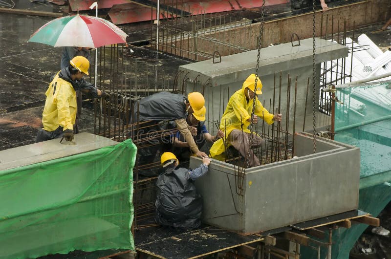 Construction workers at high-rise building