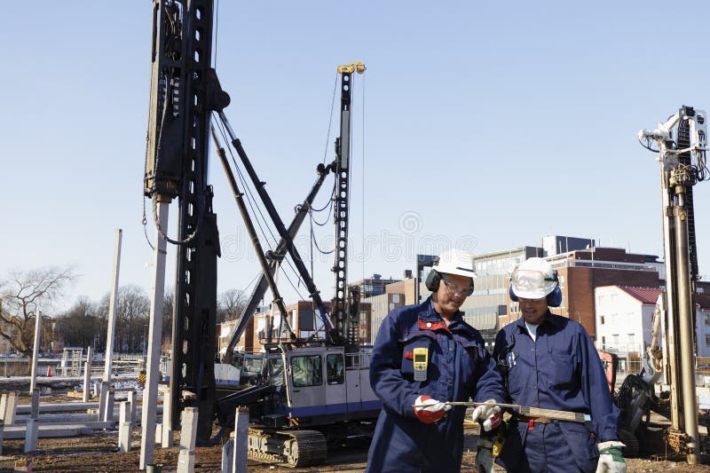 Construction workers inside building site