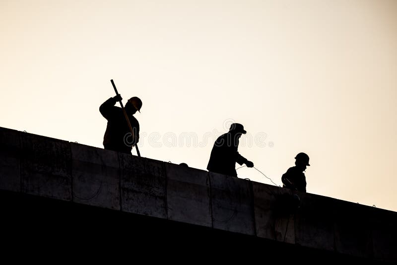 Construction workers silhouette stock images Construction workers silhouette stock images
