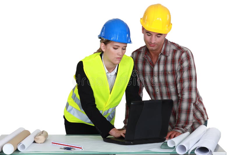 Constructores que trabajan junto imagenes de archivo Constructores que trabajan junto imagenes de archivo