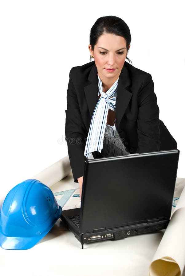 Close up of constructor woman engineer working in office on laptop and projects isolated on white background,check out. Close up of constructor woman engineer working in office on laptop and projects isolated on white background,check out