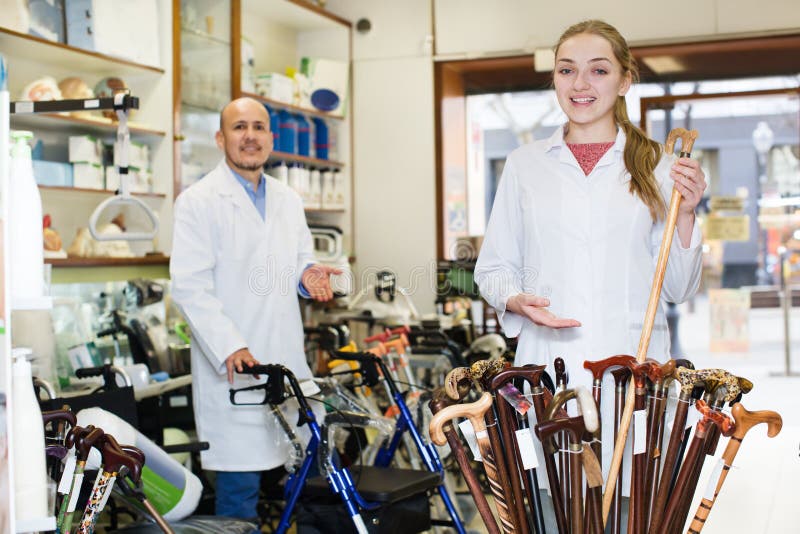 Two Orthopedists Working in Special Store with Orthopaedic Goods Stock