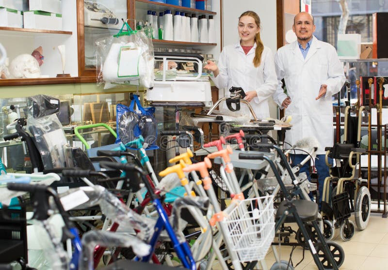 Consultants in Store with Orthopaedic Goods Stock Photo Image of