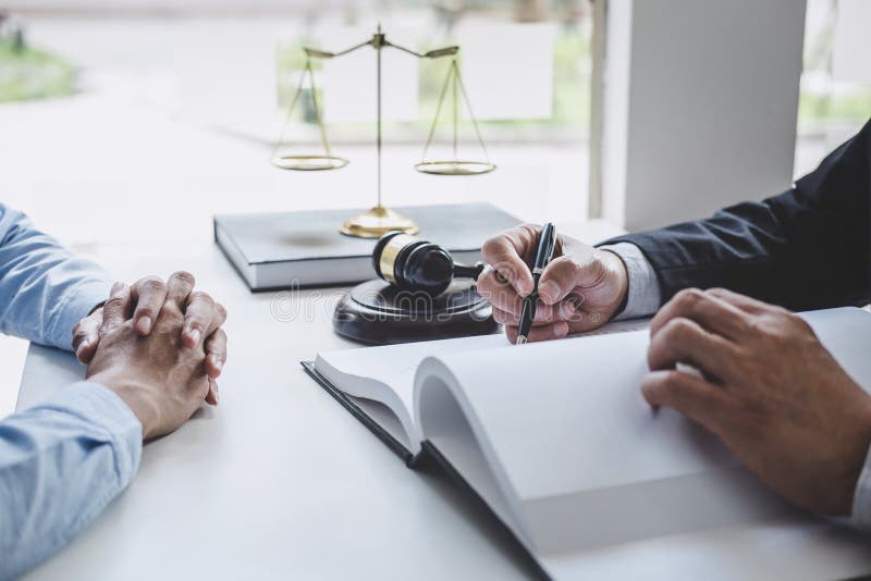 Consultation and conference of Male lawyers and professional businesswoman working and discussion having at law firm in office. royalty free stock photos Consultation and conference of Male lawyers and professional businesswoman working and discussion having at law firm in office. royalty free stock photos