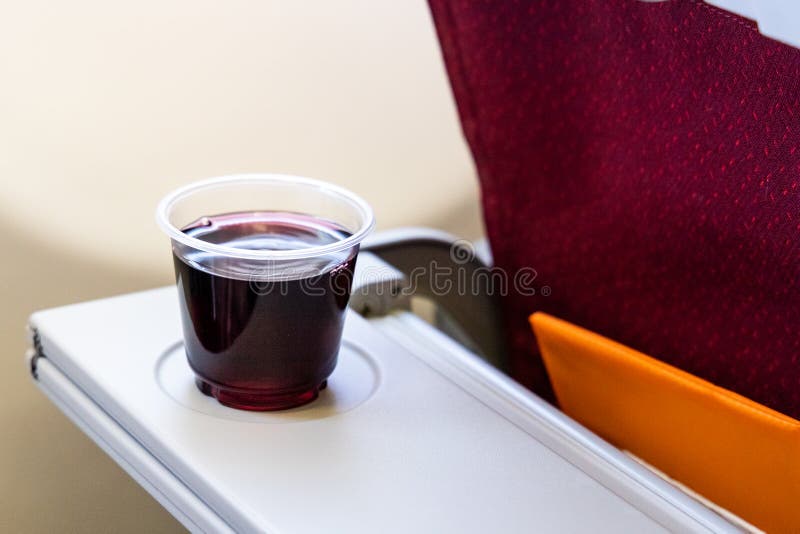 Consume too much red wine or alcohol in-flight causes dehydration stock photos Consume too much red wine or alcohol in-flight causes dehydration stock photos