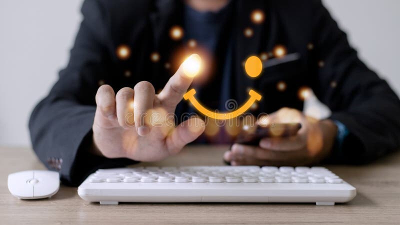 The consumer answered the survey in a conceptual way. Customer creates a happy face smiling symbol using a digital pen. The notion royalty free stock photography