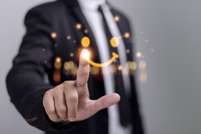 The consumer answered the survey in a conceptual way. Customer creates a happy face smiling symbol using a digital pen. The notion stock photography