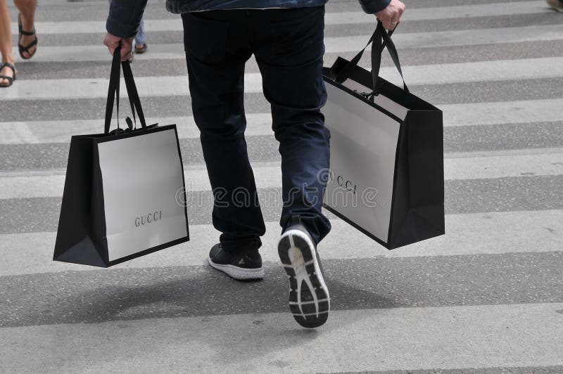 Consumer with Gucci Shopping Bags on Strieget in Copenhagen Editorial Photo  - Image of gucci, kopemhagen: 186776426