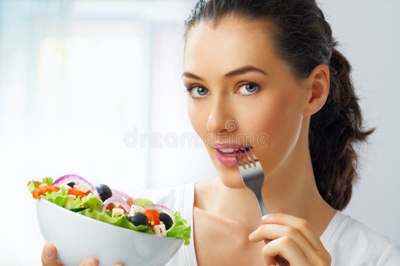 Consumición del alimento sano imagenes de archivo Consumición del alimento sano imagenes de archivo