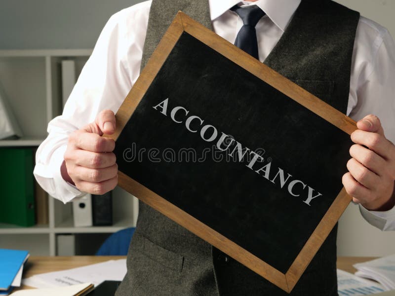 Commercialista con l'iscrizione 'Contabilità' fotografie stock