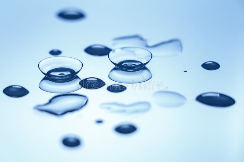 Contact Lenses with Water Drops on Reflective Surface Stock Image Image of surface, lenses
