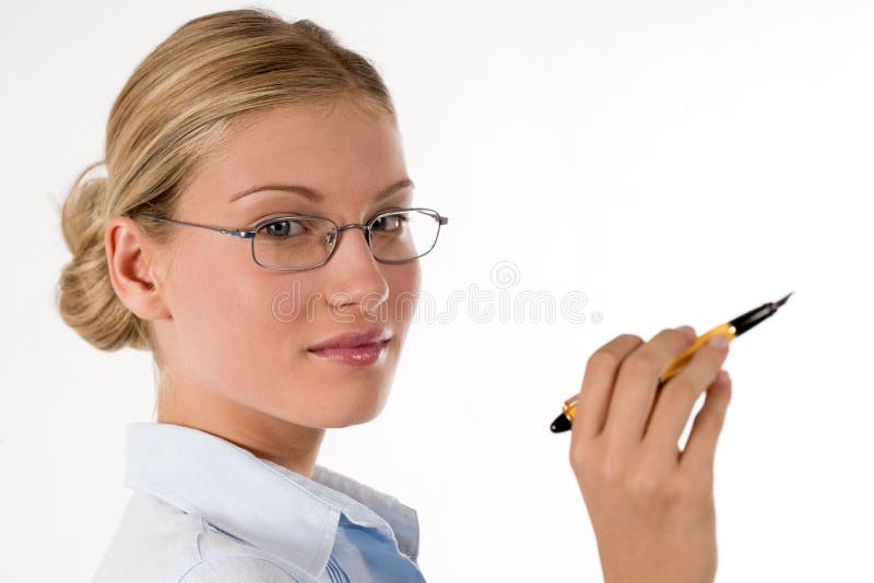 Contemplative business woman with pen