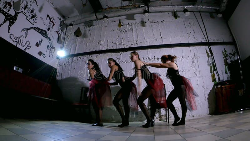 Contemporary dance performance of four dancers