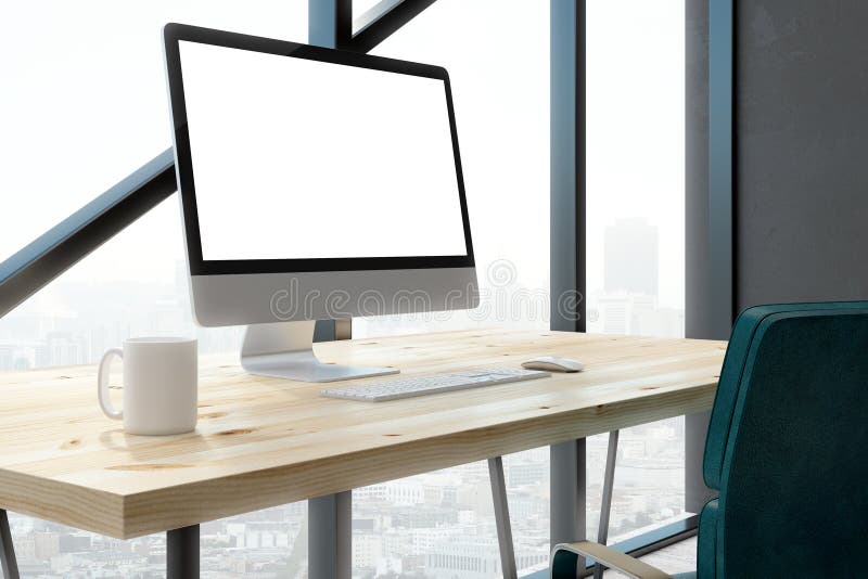 Contemporary office with empty white computer screen royalty free stock image