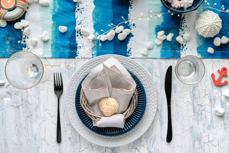 Contemporary Summertime Table Setting with Nautical Sea Decorations on Blue  and White Stripy Runner, Classic Blue and White Plates Stock Image - Image  of setting, composition: 188335379