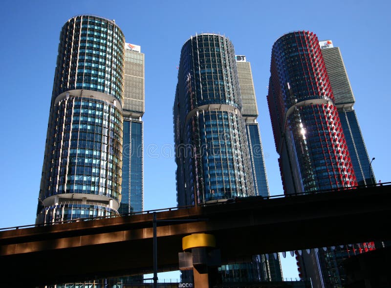 Three modern cylindrical glass skyscrapers. International Towers, Barangaroo, Syndey, Australia. Triplet highrise buildings