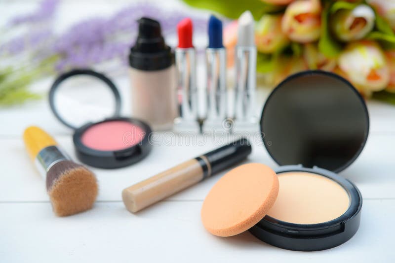 Content of Cosmetic Bag. Lipstick, Eye Shadows, Nail Polish, Rouge