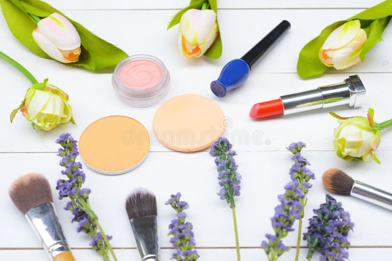 Content of Cosmetic Bag. Lipstick, Eye Shadows, Nail Polish, Rouge