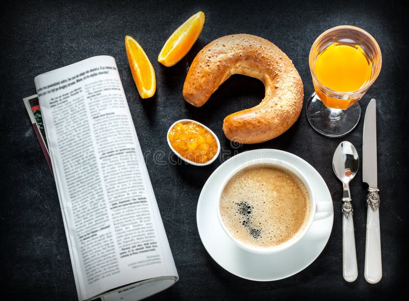 Continental breakfast on black chalkboard