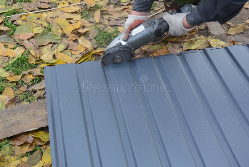 Contractor Cutting Metal Roof Sheets, Metal Tile. Contractor Cutting