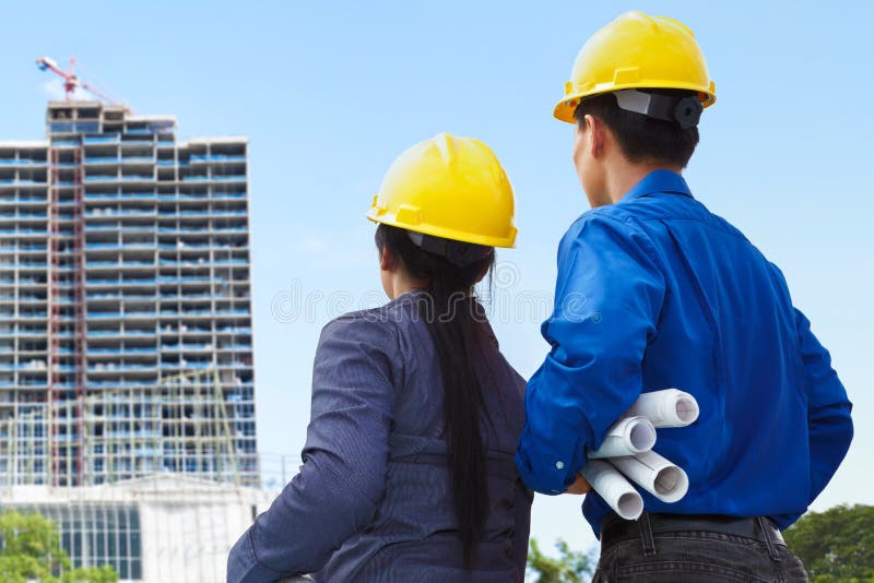 Contratantes e projetos de edifício imagens de stock royalty free