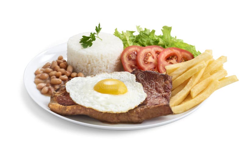 Contre la plaque exécutive du filet avec la plaque exécutif de salade de grains de riz avec du riz image libre de droits