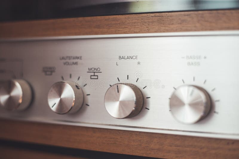 Silver Wooden Vintage Amplifier Close Up of Control Knobs Stock Photo