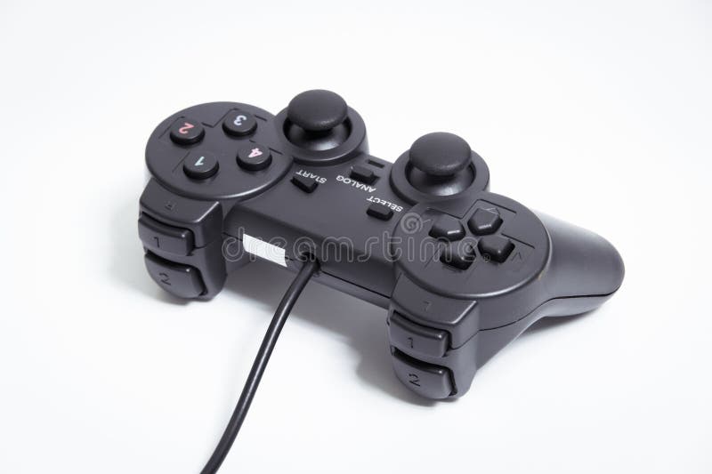 Controlador preto no dispositivo de vídeo game de fundo branco joystick em um fundo branco fotos de stock