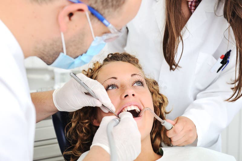 Controle dos dentes do dentista