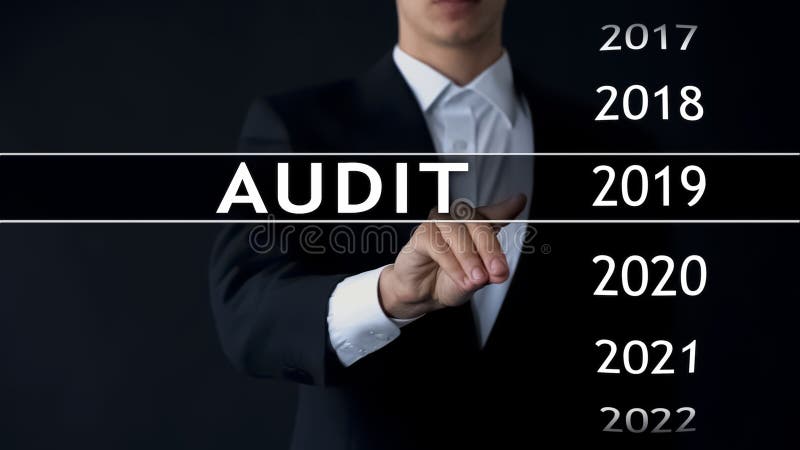 Audit report 2019, businessman finds data in virtual archive financial statement, stock photo. Audit report 2019, businessman finds data in virtual archive financial statement, stock photo