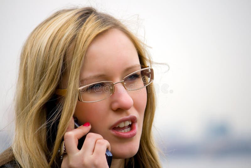 Phone conversation of the young blonde girl. Phone conversation of the young blonde girl