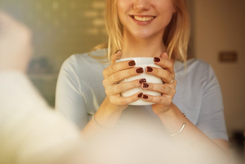 Conversation of confident man and young blond woman at home royalty free stock images Conversation of confident man and young blond woman at home royalty free stock images
