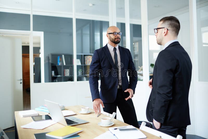 Conversation in office stock photo. Image of consulting 95722312