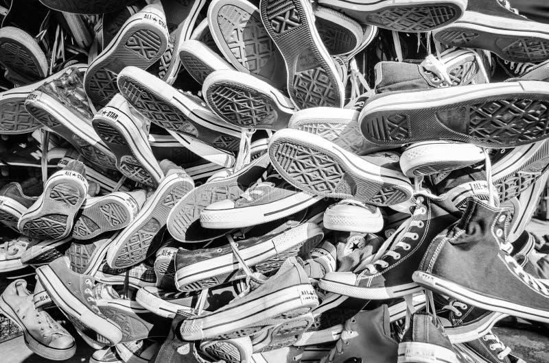 black and white photography of converse