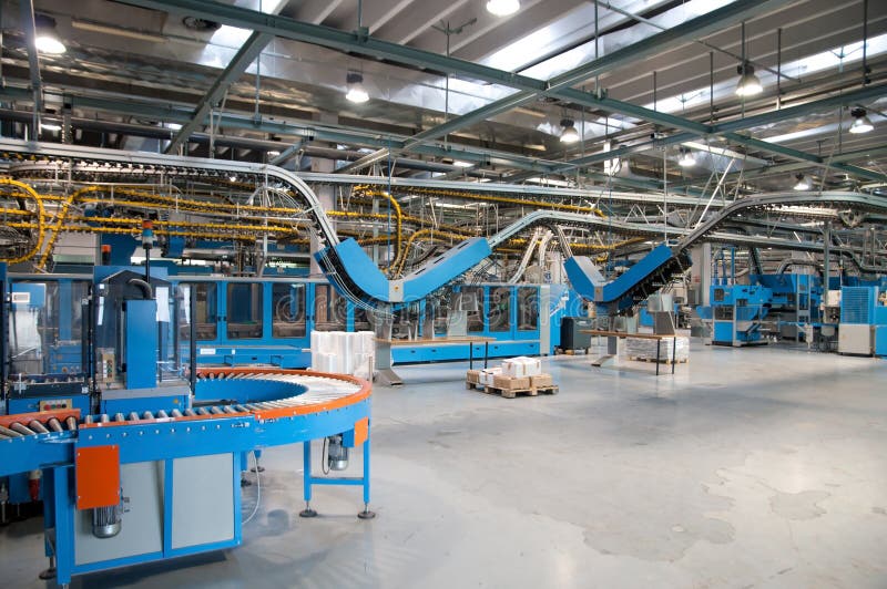 Conveyor belt for newspapers. Conveyor belt system for conveys daily newspapers in a major newspaper printing press royalty free stock photo Conveyor belt for newspapers. Conveyor belt system for conveys daily newspapers in a major newspaper printing press royalty free stock photo