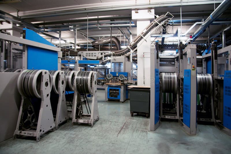 Conveyor belt for newspapers. Conveyor belt system for conveys daily newspapers in a major newspaper printing press royalty free stock photo Conveyor belt for newspapers. Conveyor belt system for conveys daily newspapers in a major newspaper printing press royalty free stock photo