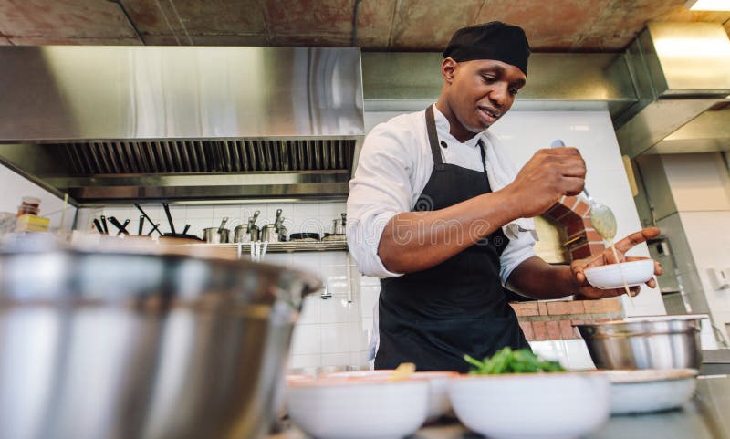 Chef Cooking Food In Restaurant Kitchen Stock Photo - Image Of Making, Cook:  103450570