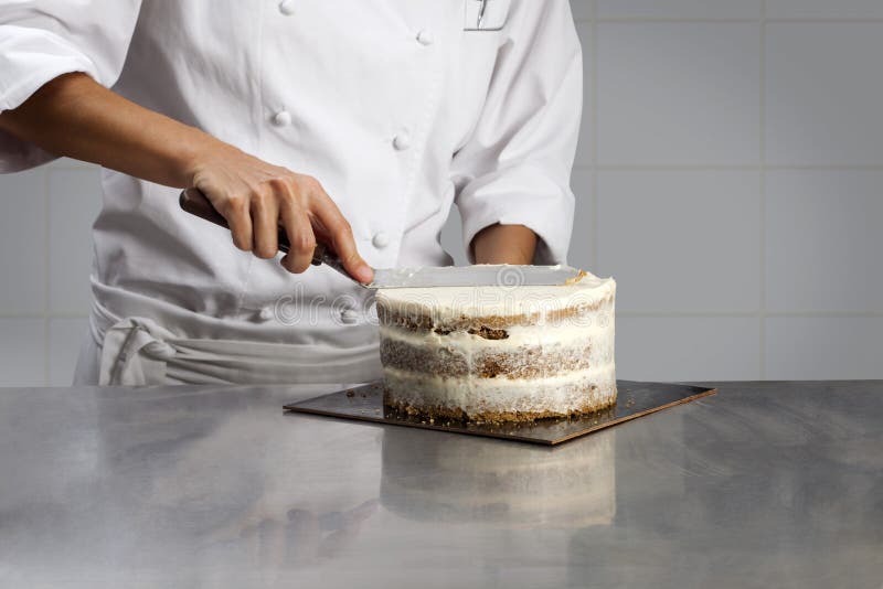 Cook Coating a Cake with Cream Stock Image Image of prepared, chef