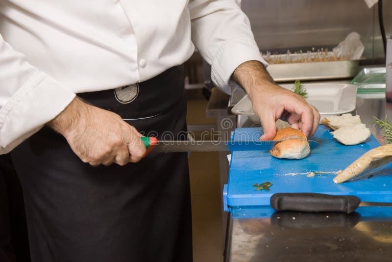 Cook cutting royalty free stock photo