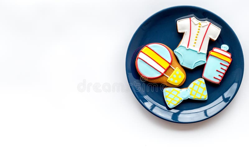 Cook gingerbread cookies on plate for baby shower on white background top view mockup