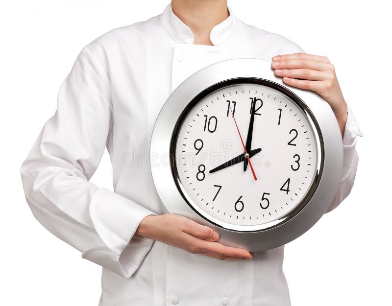 Cook holding a clock stock image. Image of lunch, learning 42421131